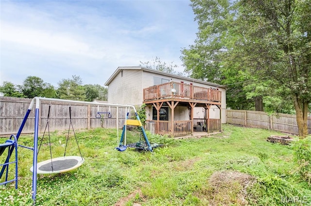7800 Chuck Ct, Godfrey, IL 62035 - rear view of property with a fenced backyard and a deck