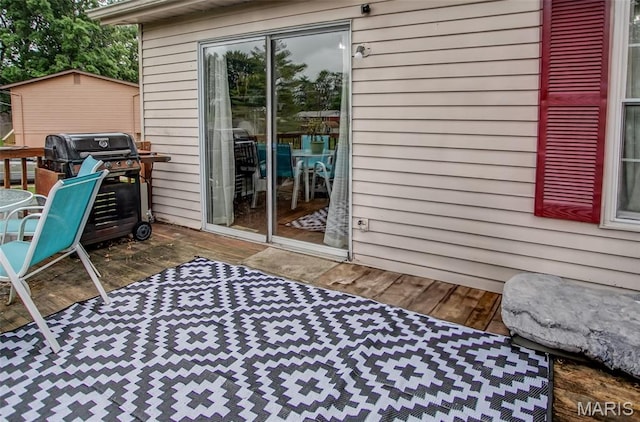 7800 Chuck Ct, Godfrey, IL 62035 - wooden terrace featuring area for grilling