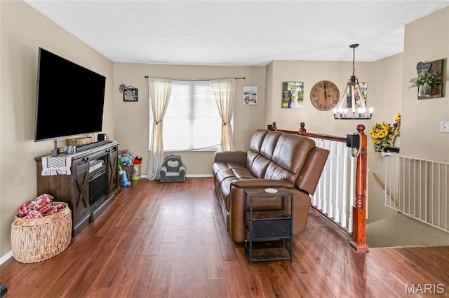 7800 Chuck Ct, Godfrey, IL 62035 - living area with wood finished floors and a chandelier