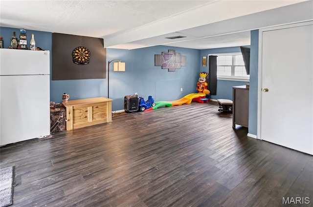 7800 Chuck Ct, Godfrey, IL 62035 - playroom with wood finished floors and baseboards