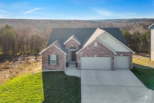 1896 W Main St, Festus, MO 63028 - view of front of home featuring brick siding, an attached garage, concrete driveway, and a front lawn
