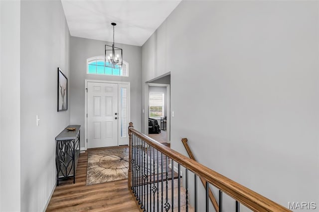 1896 W Main St, Festus, MO 63028 - entryway featuring wood finished floors, a chandelier, and a high ceiling