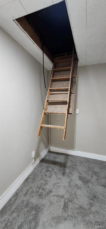 115 N 5th St, De Soto, MO 63020 - stairs featuring carpet flooring and baseboards