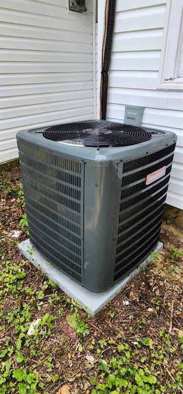 115 N 5th St, De Soto, MO 63020 - exterior view of a central air condition unit