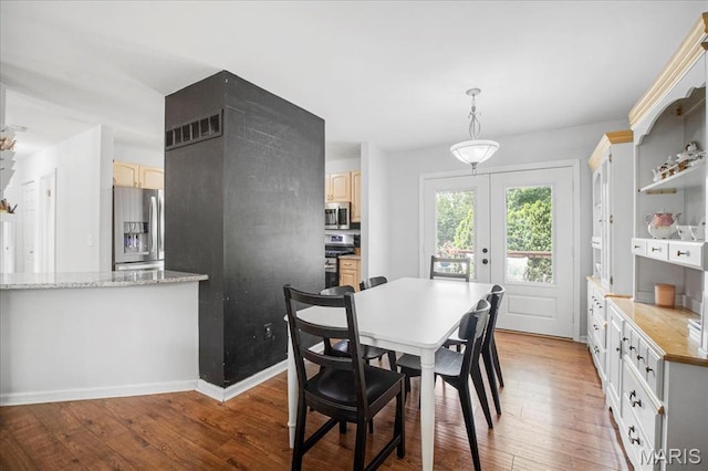 5 N Willow Grove Ct, Saint Peters, MO 63376 - dining area featuring french doors and wood-type flooring