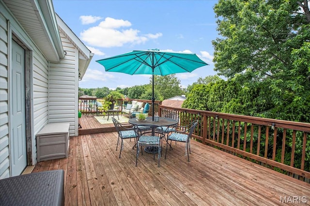 5 N Willow Grove Ct, Saint Peters, MO 63376 - wooden deck with outdoor dining area