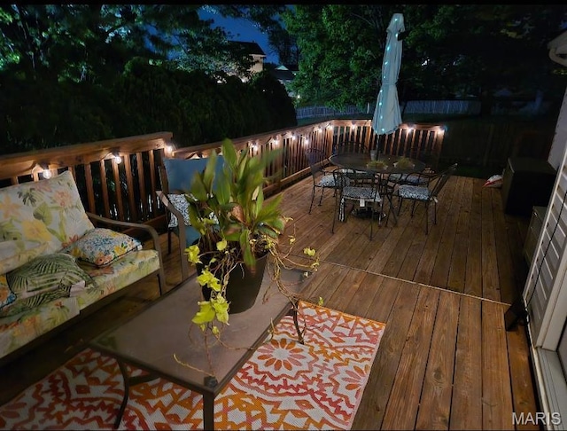 5 N Willow Grove Ct, Saint Peters, MO 63376 - deck at night featuring outdoor dining space