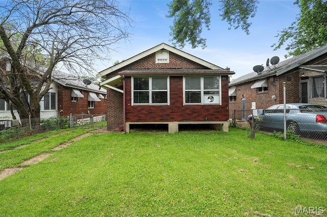 887 Wall St, Saint Louis, MO 63147 - back of house featuring brick siding