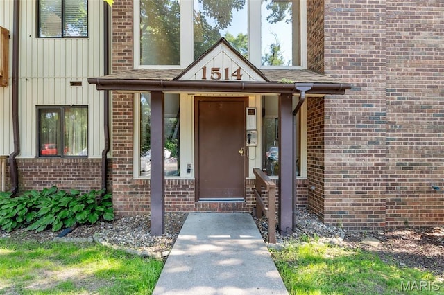 1514 Summer Run Dr Unit 208, Florissant, MO 63033 - view of exterior entry featuring brick siding