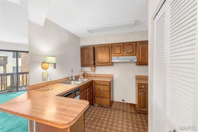 1514 Summer Run Dr Unit 208, Florissant, MO 63033 - kitchen with a peninsula, under cabinet range hood, brown cabinetry, light countertops, and dishwashing machine