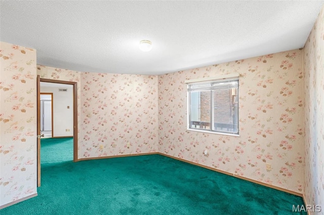 1514 Summer Run Dr Unit 208, Florissant, MO 63033 - carpeted empty room featuring a textured ceiling and wallpapered walls
