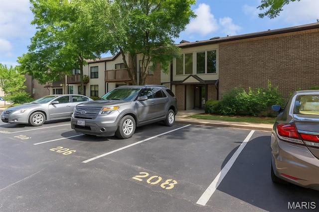 1514 Summer Run Dr Unit 208, Florissant, MO 63033 - view of uncovered parking lot