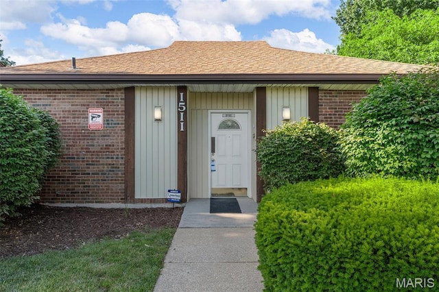 1514 Summer Run Dr Unit 208, Florissant, MO 63033 - property entrance with brick siding and a shingled roof