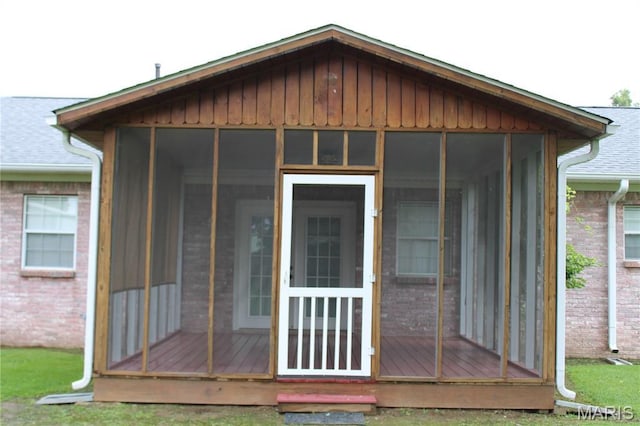 17576 Rigdon St, Kennett, MO 63857 - back of property featuring a sunroom and brick siding