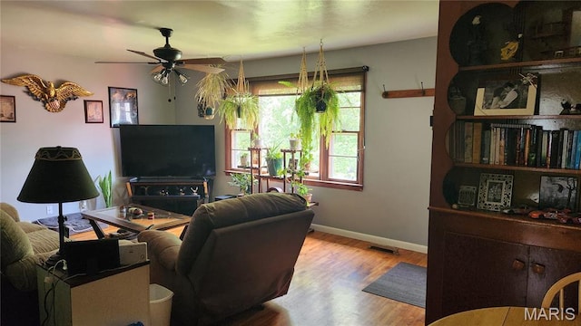 800 N Hickory St, Salem, MO 65560 - living area featuring ceiling fan and wood finished floors