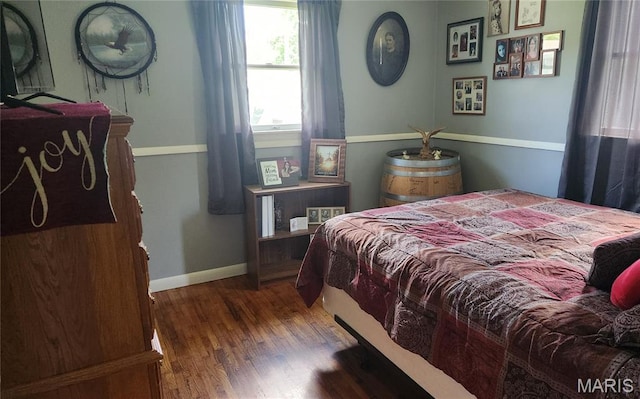 800 N Hickory St, Salem, MO 65560 - bedroom with wood finished floors and baseboards