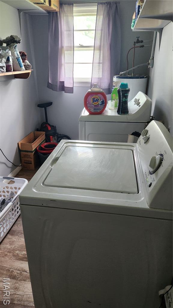 800 N Hickory St, Salem, MO 65560 - laundry area with washing machine and clothes dryer and water heater