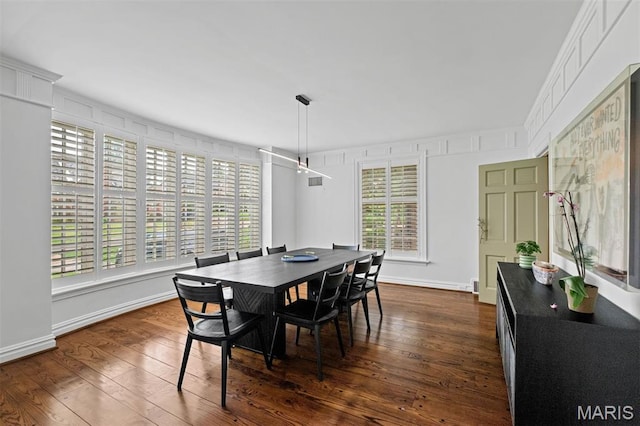 20 Ridgemoor Dr, Clayton, MO 63105 - dining area with dark wood-style flooring and baseboards