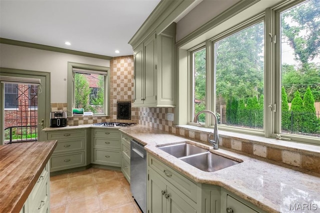 20 Ridgemoor Dr, Clayton, MO 63105 - kitchen featuring wood counters, stainless steel appliances, and plenty of natural light