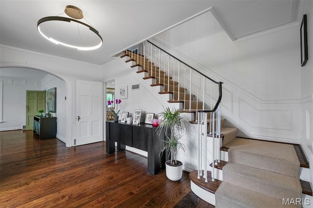 20 Ridgemoor Dr, Clayton, MO 63105 - stairway with wood finished floors and arched walkways