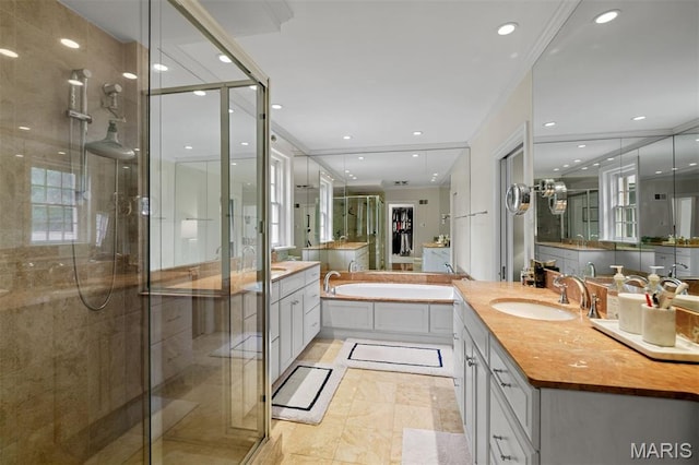 20 Ridgemoor Dr, Clayton, MO 63105 - full bath featuring a shower stall, vanity, a bath, and recessed lighting