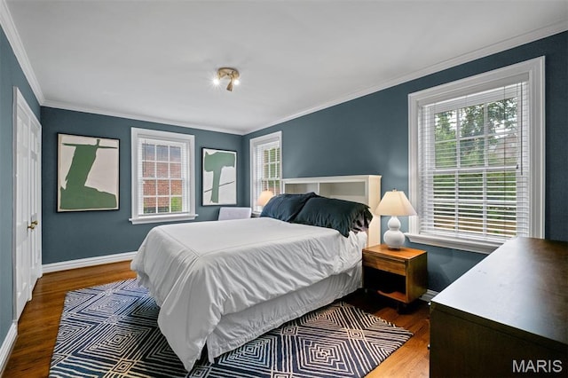 20 Ridgemoor Dr, Clayton, MO 63105 - bedroom featuring dark wood-style floors, multiple windows, and crown molding