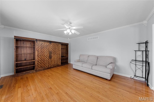 3924 Cambridge Crossing Dr, Saint Charles, MO 63304 - living room with light wood-type flooring, ceiling fan, and ornamental molding
