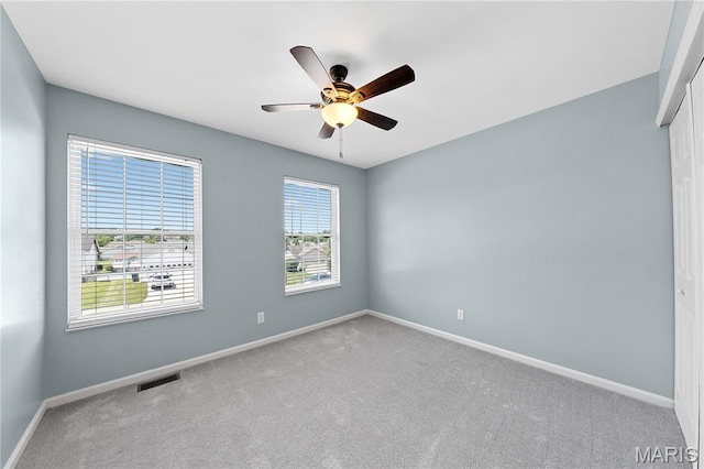 3924 Cambridge Crossing Dr, Saint Charles, MO 63304 - carpeted empty room with baseboards and ceiling fan