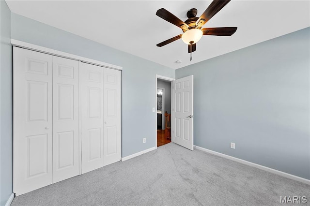 3924 Cambridge Crossing Dr, Saint Charles, MO 63304 - unfurnished bedroom featuring carpet, a closet, and a ceiling fan