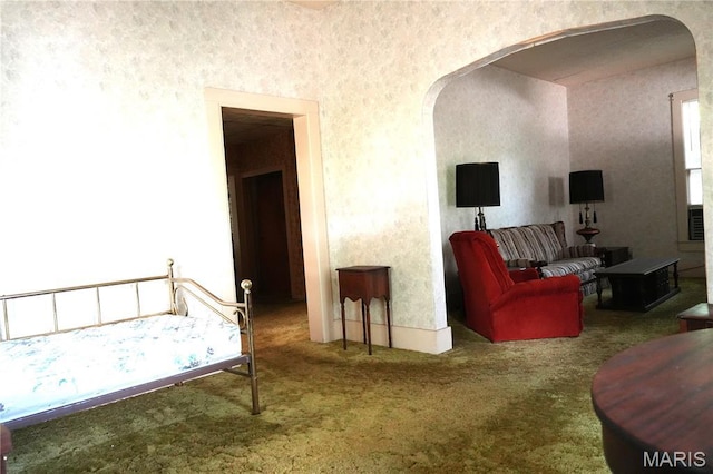 114 W 2nd St S, Mount Olive, IL 62069 - carpeted bedroom featuring arched walkways