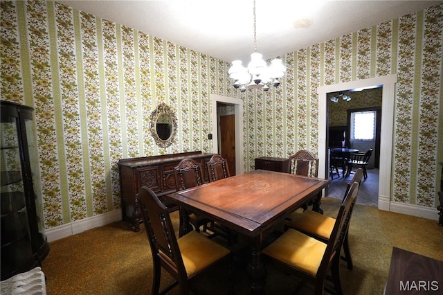 114 W 2nd St S, Mount Olive, IL 62069 - dining space featuring a chandelier, wallpapered walls, and carpet floors