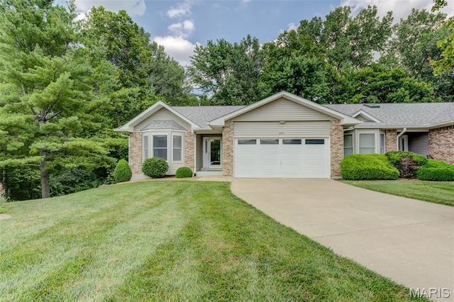 3004 Oakmont Ct Unit 15C, Saint Charles, MO 63301 - single story home with an attached garage, concrete driveway, a front lawn, and brick siding