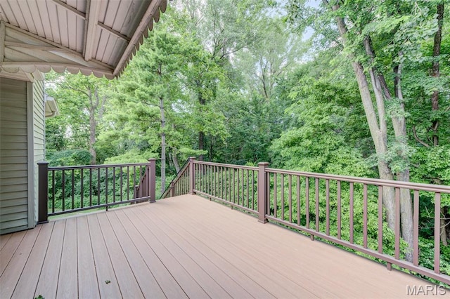 3004 Oakmont Ct Unit 15C, Saint Charles, MO 63301 - wooden terrace with a view of trees