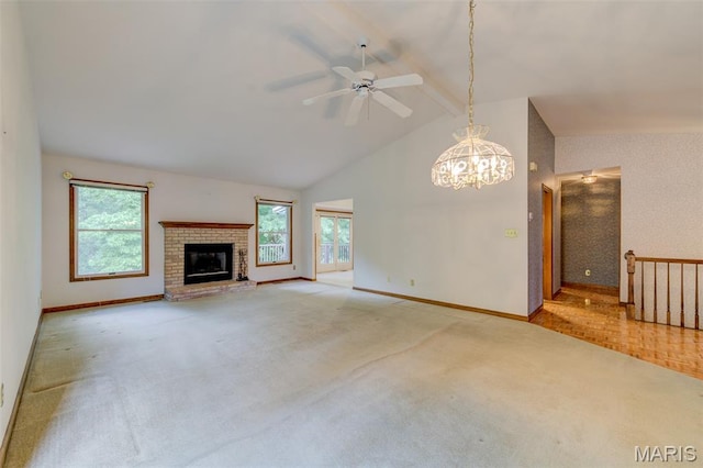 3004 Oakmont Ct Unit 15C, Saint Charles, MO 63301 - unfurnished living room with beamed ceiling, healthy amount of natural light, ceiling fan, carpet, and a brick fireplace