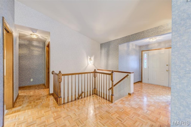 3004 Oakmont Ct Unit 15C, Saint Charles, MO 63301 - hall featuring an upstairs landing and wallpapered walls