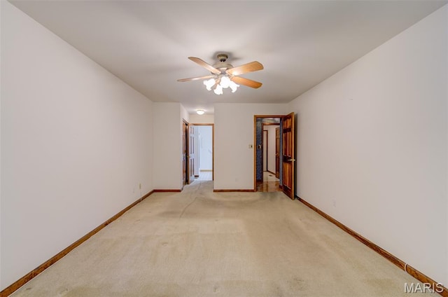 3004 Oakmont Ct Unit 15C, Saint Charles, MO 63301 - spare room featuring light carpet and a ceiling fan