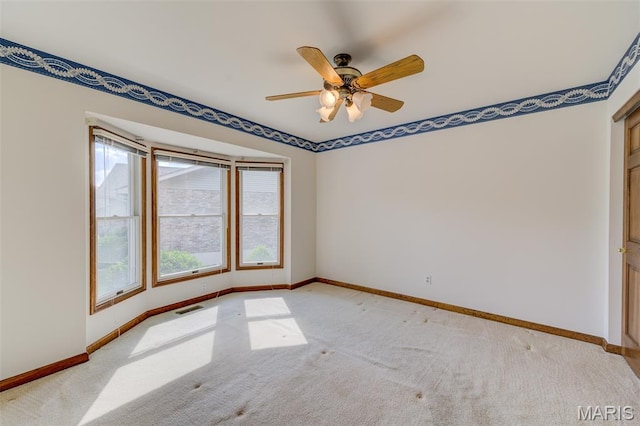 3004 Oakmont Ct Unit 15C, Saint Charles, MO 63301 - spare room with light carpet and a ceiling fan
