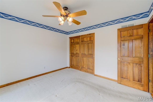 3004 Oakmont Ct Unit 15C, Saint Charles, MO 63301 - unfurnished bedroom featuring light carpet, a closet, and ceiling fan