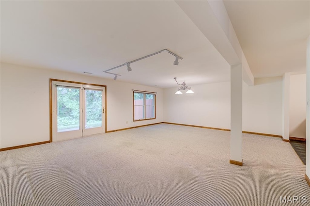 3004 Oakmont Ct Unit 15C, Saint Charles, MO 63301 - empty room featuring rail lighting and carpet
