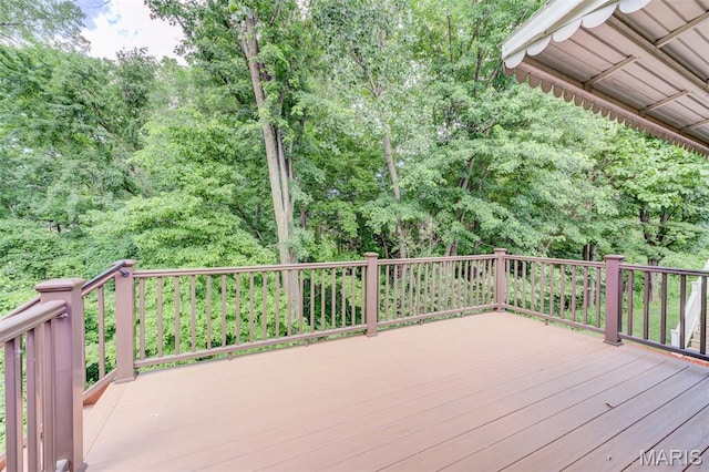 3004 Oakmont Ct Unit 15C, Saint Charles, MO 63301 - wooden deck featuring a wooded view