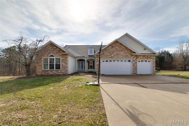 52 Cedar Branch Ln, Wentzville, MO 63385 - traditional-style home with driveway, a garage, a front yard, and stone siding