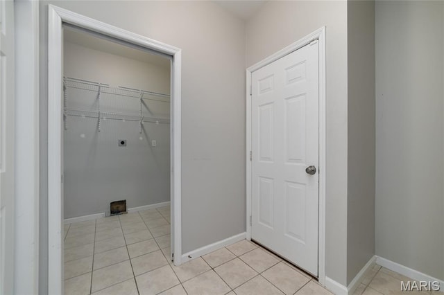 52 Cedar Branch Ln, Wentzville, MO 63385 - laundry room featuring hookup for an electric dryer and light tile patterned floors