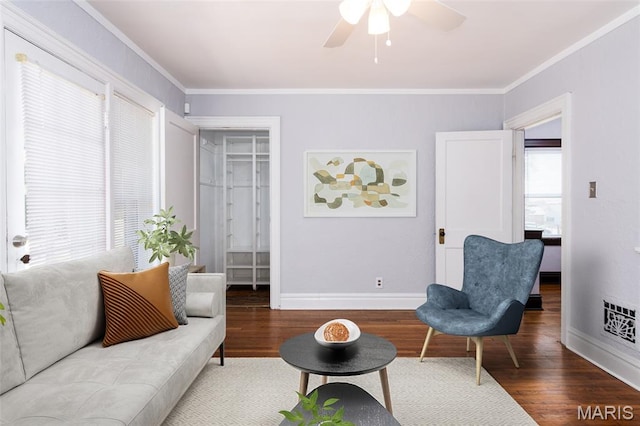 6162 W Park Ave, Saint Louis, MO 63139 - living room with wood finished floors, a ceiling fan, and ornamental molding