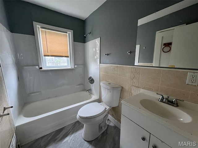 853 Nassau Dr, Saint Louis, MO 63147 - bathroom featuring shower / bath combination, vanity, and tile walls
