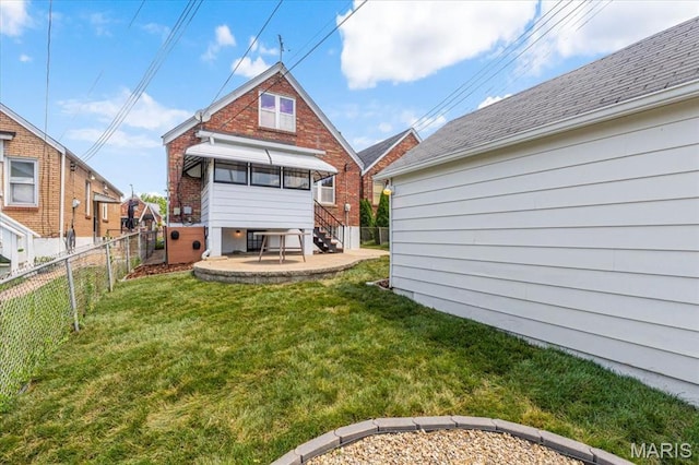 5660 Oleatha Ave, Saint Louis, MO 63139 - rear view of property with a fenced backyard and brick siding