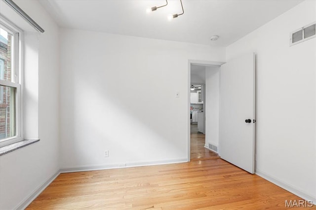 5660 Oleatha Ave, Saint Louis, MO 63139 - spare room with light wood finished floors and baseboards