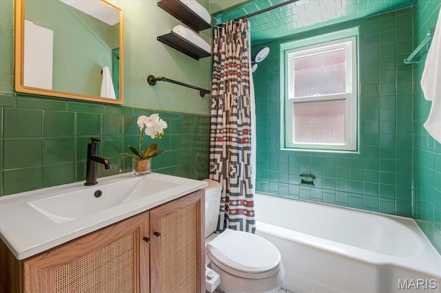 5660 Oleatha Ave, Saint Louis, MO 63139 - bathroom with tile walls, vanity, and shower / bathtub combination with curtain