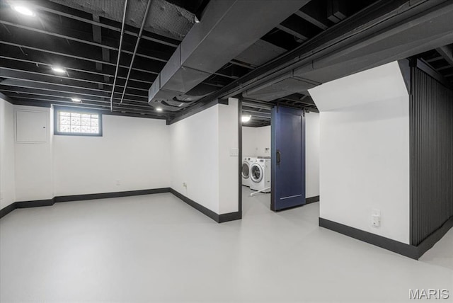 5660 Oleatha Ave, Saint Louis, MO 63139 - basement featuring washer and dryer and electric panel