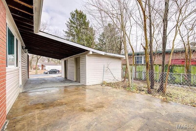 675 Pimlico Dr, Florissant, MO 63033 - garage featuring an attached carport