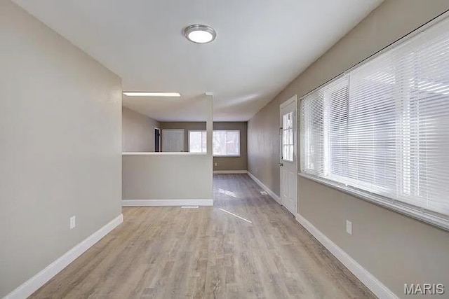 675 Pimlico Dr, Florissant, MO 63033 - empty room with wood finished floors and baseboards